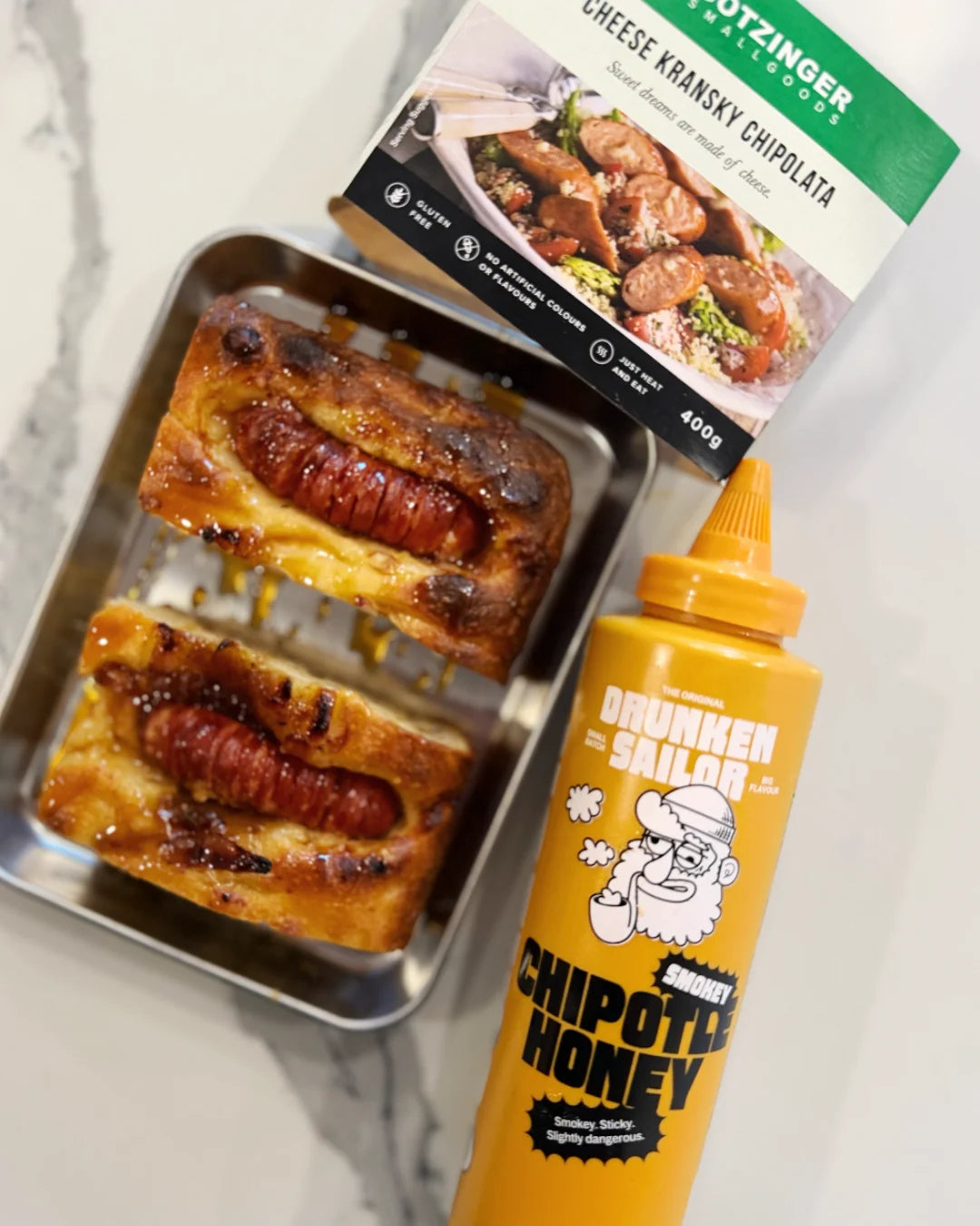 Onion Focaccia with Hassleback Chipolatas by @drunkensailorcanningco