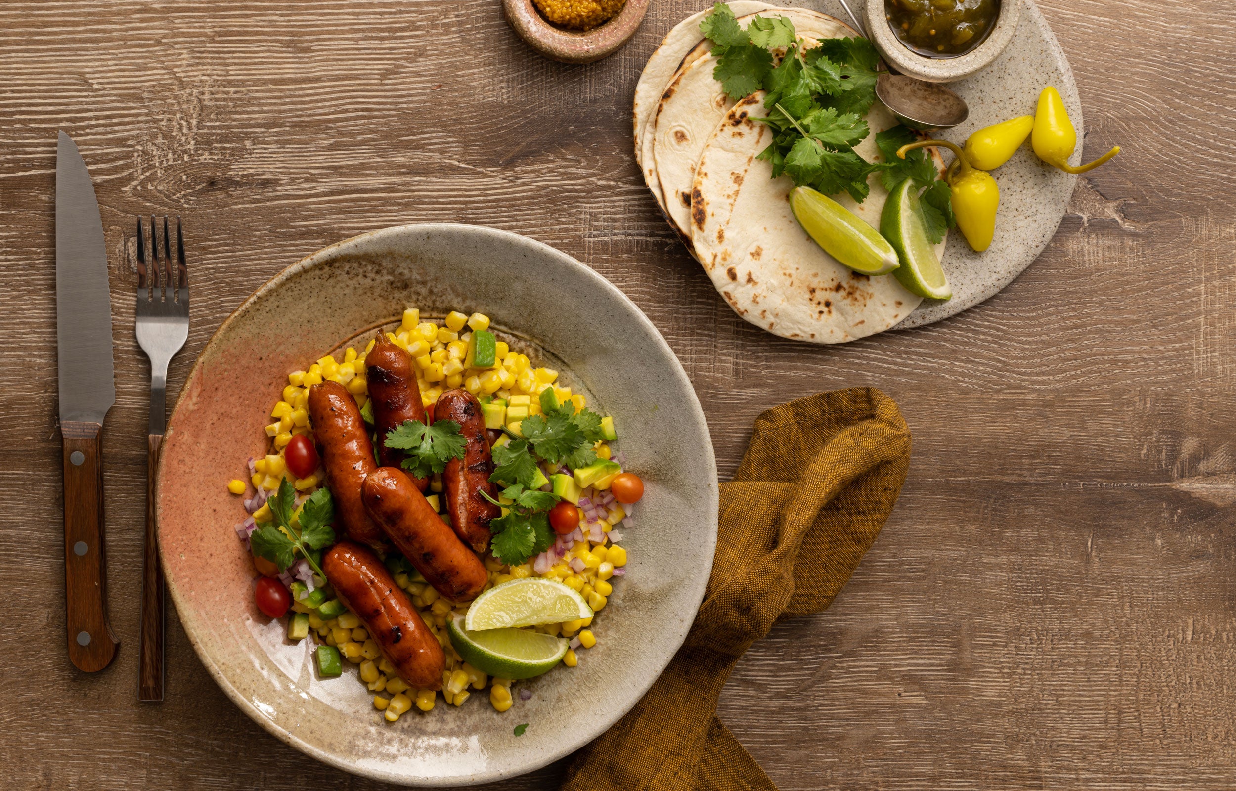 Gotzinger Smallgoods on Mexican Dish with Corn and Tortillas