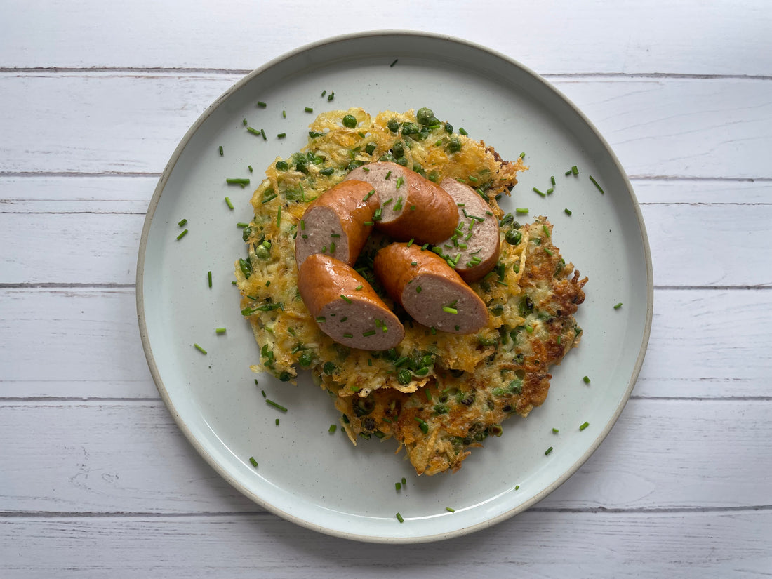 Potato, Green Pea and Cheddar Rosti Served with Rookworst