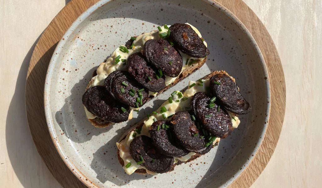 Black Pudding with Smashed Devilled Eggs on Toast